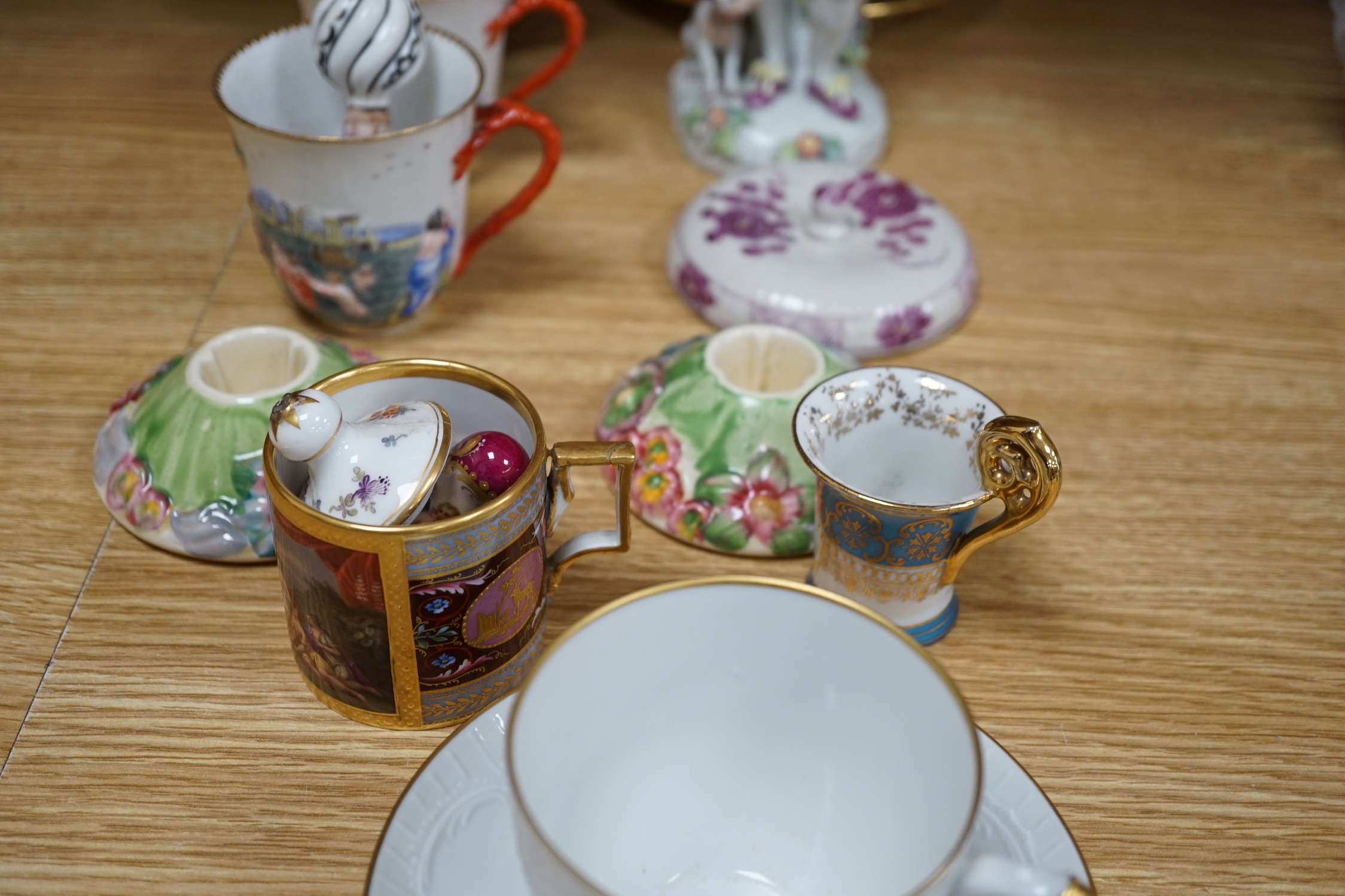 19th century Continental tableware, including Richard Ginori Capodimonte style cups and a porcelain figure group of a gentleman and dog, largest 25cm high